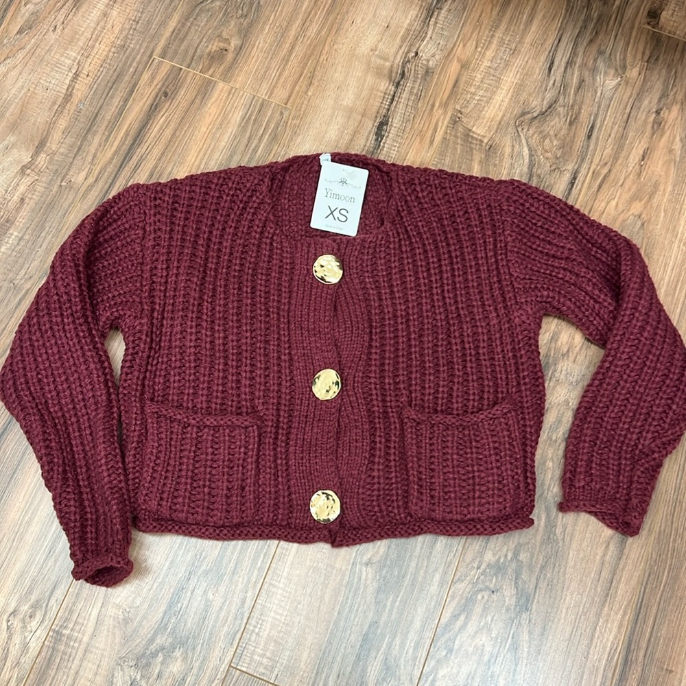 Ladies button up sweater. NWT